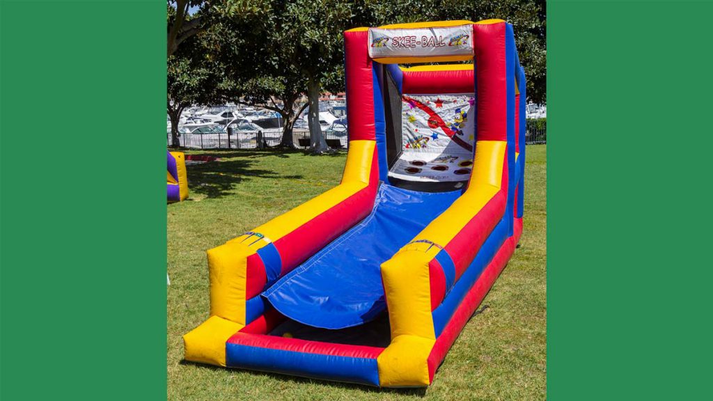 This giant inflatable version of the arcade classic, Skeeball from James Event Productions, will challenge your guests to get a high score.