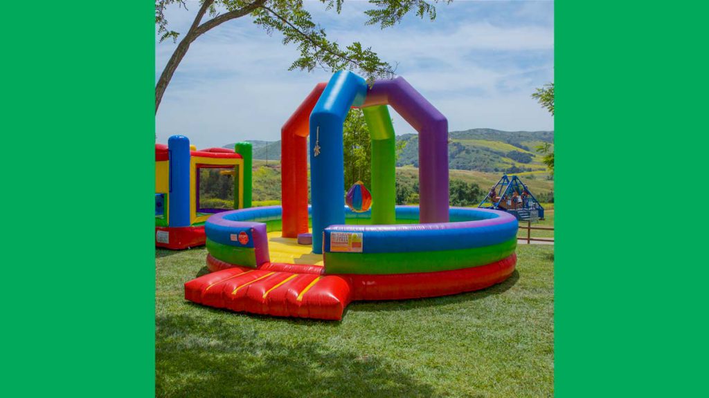 Wacky Ball is a fun and safe inflatable attraction where kids can challenge each other to stay upright while trying to knock each other off their pedestals.