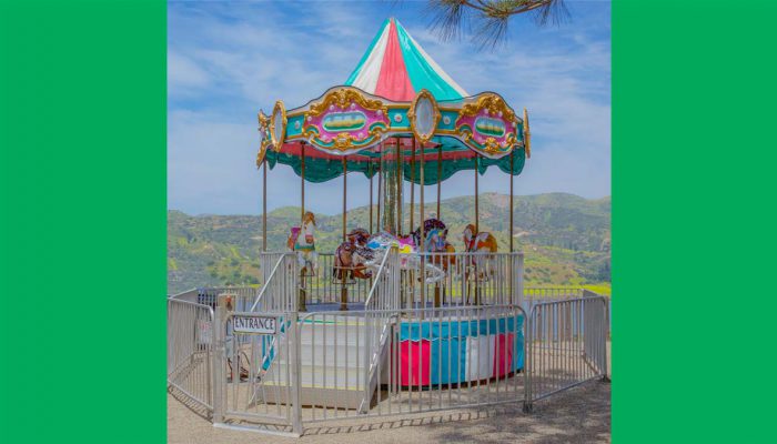 This classic, colorful Carousel from James Event Productions is just the right size for your smaller guests with beautifully painted horses and space for their parents to ride along-side.
