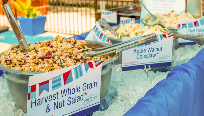 Delicious side salads on a buffet line at a company picnic produced by James Event Productions.