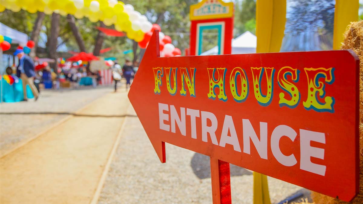 The entrance sign welcoming you to a carnival midway at James Ebent Productions.